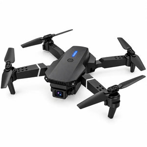 A black quadcopter drone with four folding propellers and a mounted camera, shown on a clean white background.